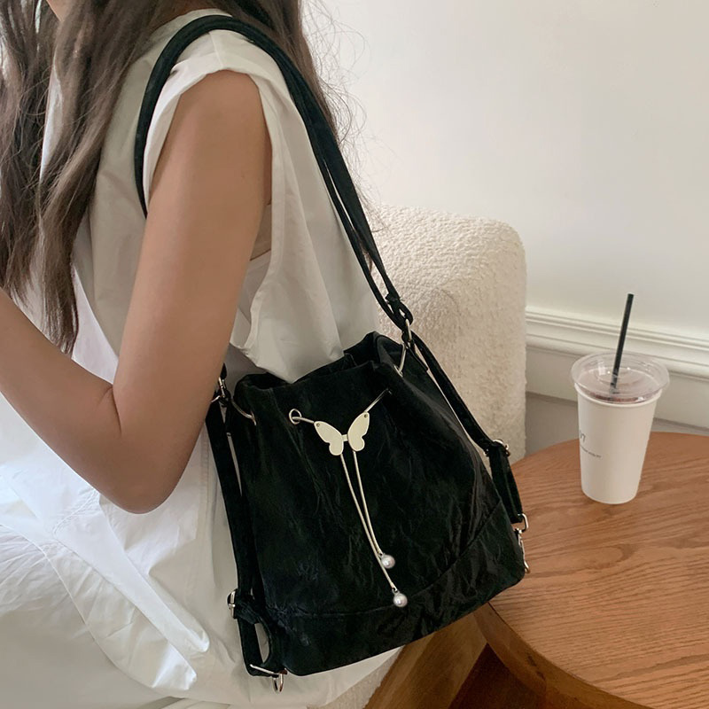 Mochila con cordón y mariposa  - Leather Work Backpack reseña y precio